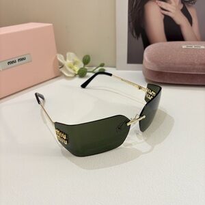 Miu Miu Green and Gold Sunglasses